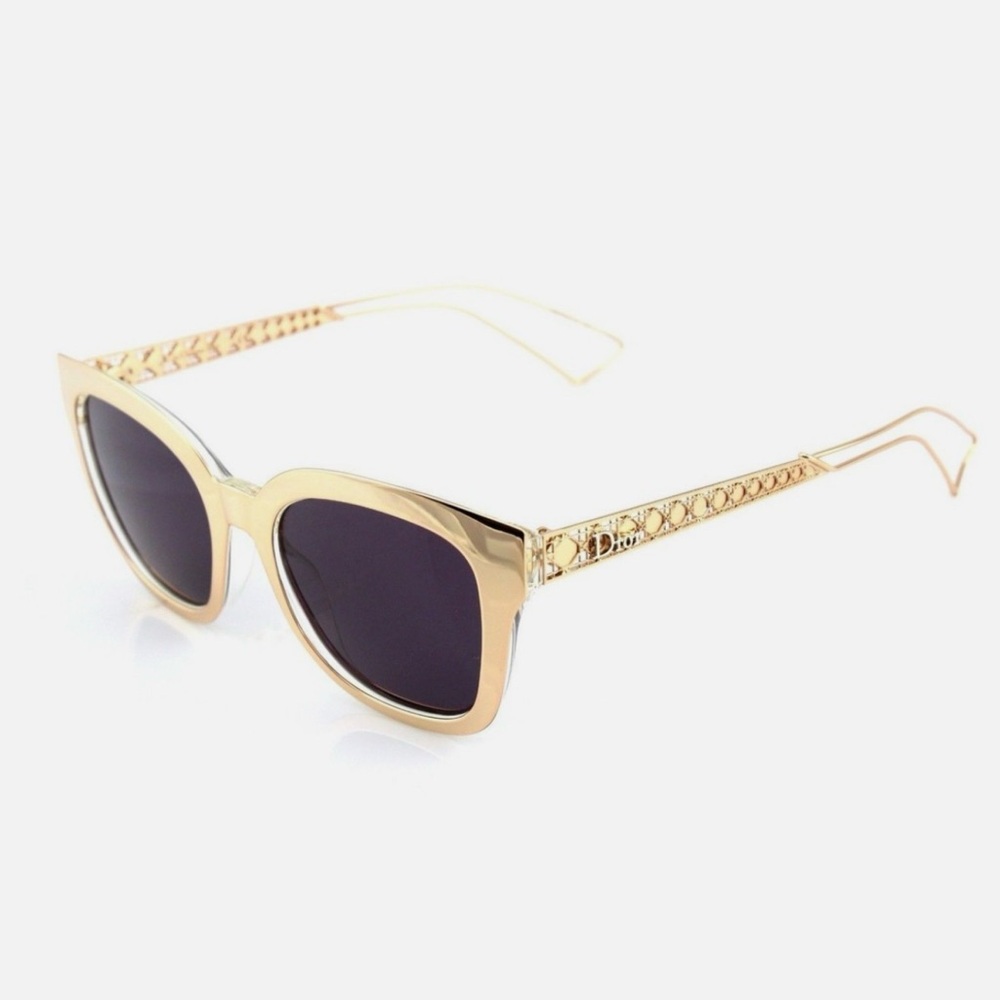 Gently used CHRISTIAN DIOR Sunglasses. Rose gold frames, dark purple lenses.